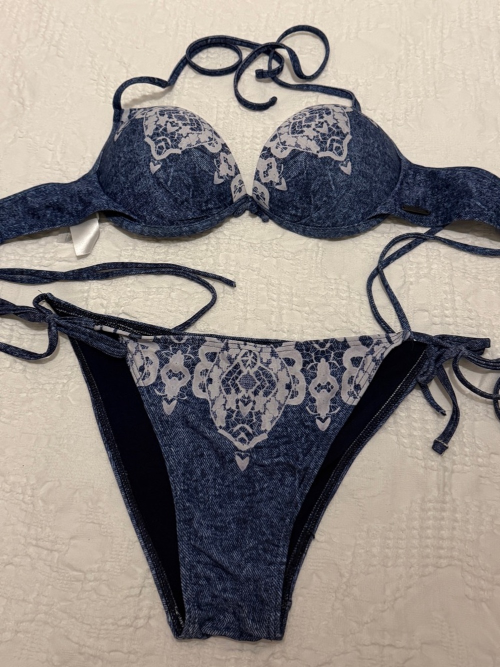 GUESS denim-print bikini set featuring white lace-style embroidery. 34C, L.
